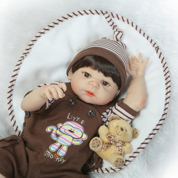 22" Full Fody Silicone Reborn Baby Boy Dolls Brown Hair Wig Magnetic Mouth Fashion Dolls For Kids Gift Baby Alive Bonecas Reborn